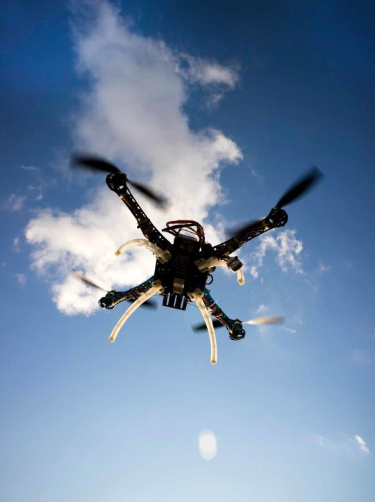 drone in flight with cloudy sky ptcuknj scaled.jpg